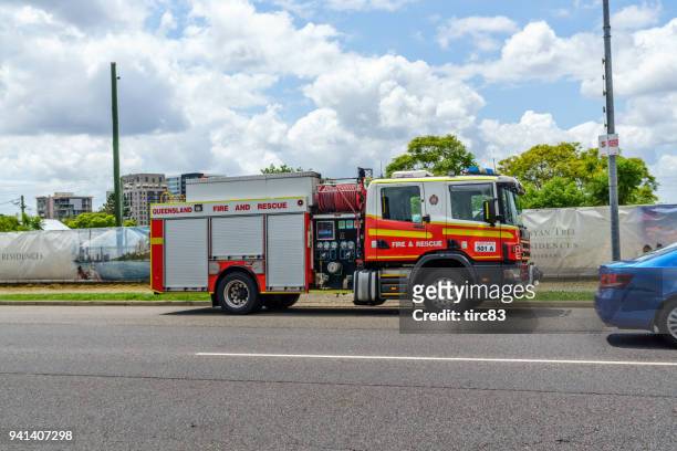 queensland fire department vehicle - australian firefighter stock pictures, royalty-free photos & images