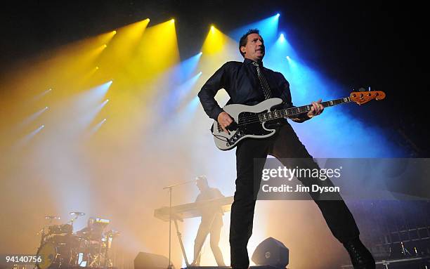 Andy McCluskey and Paul Humphreys of British synth-pop group Orchestral Manoeuvres in the Dark perform live on stage at Wembley Arena as support to...