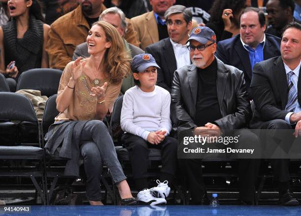 Celine Dion, Rene Charles Angelil and Rene Angelil attend the Portland Trailblazers Vs. New York Knicks game at Madison Square Garden on December 7,...