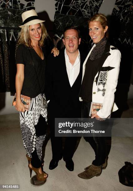 Blogger Scott Schuman poses with Sarah-Jane Clarke and Heidi Middleton from Sass & Bide, as he launches his eponymous book at Sass & Bide Oxford...