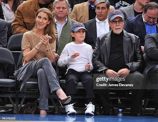 Celine Dion, Rene Charles Angelil and Rene Angelil attend the Portland Trailblazers Vs. New York Knicks game at Madison Square Garden on December 7,...