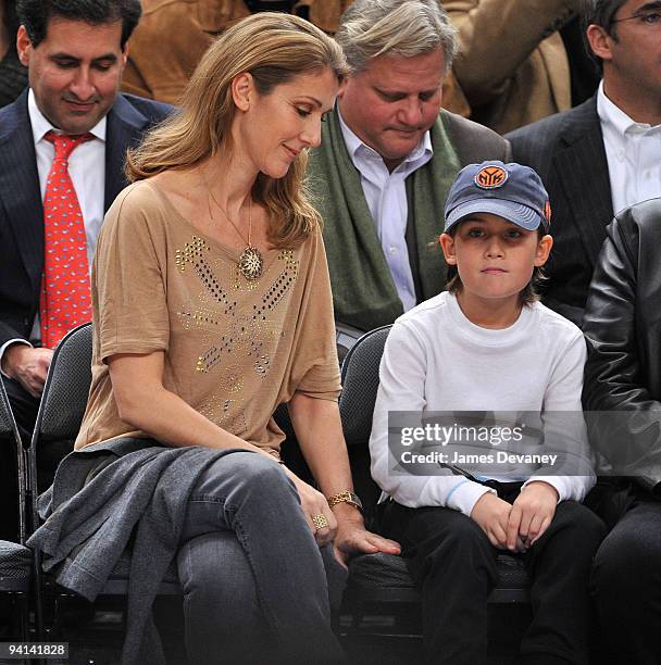 Celine Dion and son Rene Charles Angelil attend the Portland Trailblazers Vs. New York Knicks game at Madison Square Garden on December 7, 2009 in...