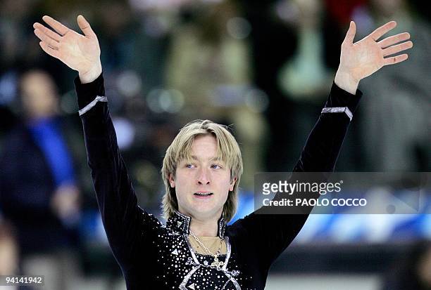 Evgeni Plushenko of Russia acknowledges the applause at the end of the men's Short Program competition at the European Figure Skating Championships...