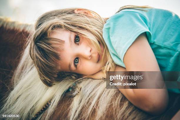 boho girl with her horse - pixalot stock pictures, royalty-free photos & images