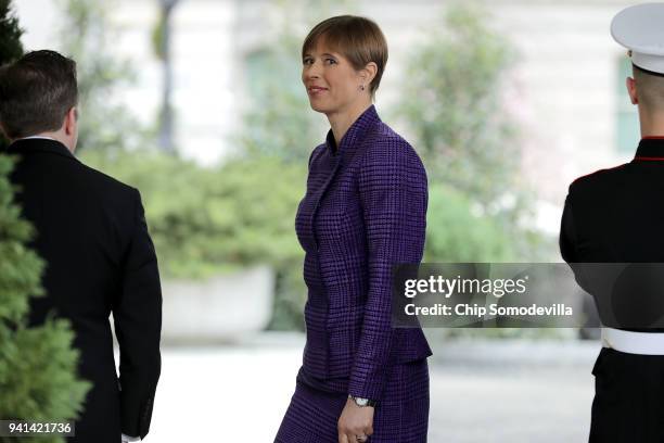 Estonian President Kersti Kaljulaid arrives at the White House before meetings with U.S. President Donald Trump and her Baltic counterparts April 3,...