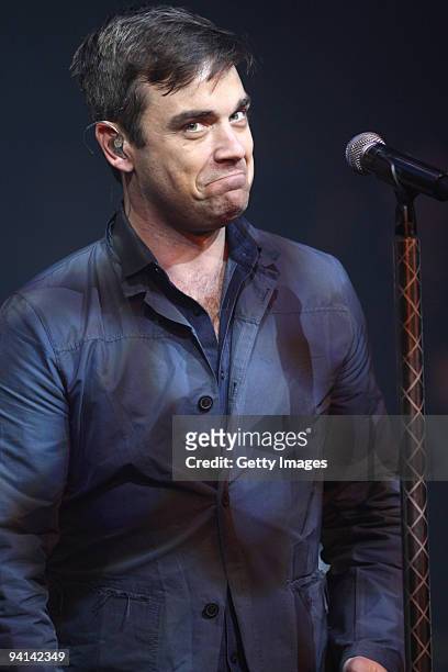 Robbie Williams performs live for BBC Radio 2 held at broadcasting House on December 8, 2009 in London, England.