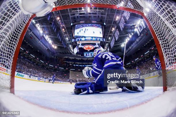 Curtis McElhinney of the Toronto Maple Leafs guards the net against the Winnipeg Jets during the second period at the Air Canada Centre on March 31,...