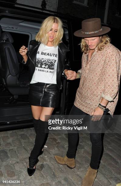 Ellie Goulding and Dougie Poynter arrive home after Ellie's intimate gig at Annabel's club on May 13, 2015 in London, England.