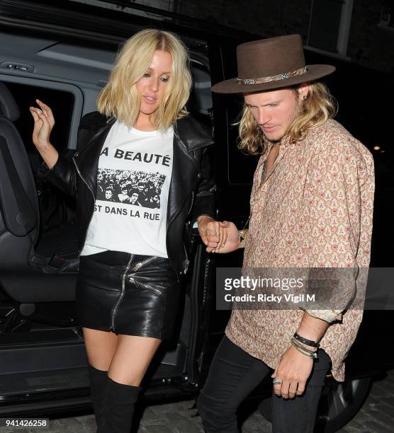 Ellie Goulding and Dougie Poynter arrive home after Ellie's intimate gig at Annabel's club on May 13, 2015 in London, England.