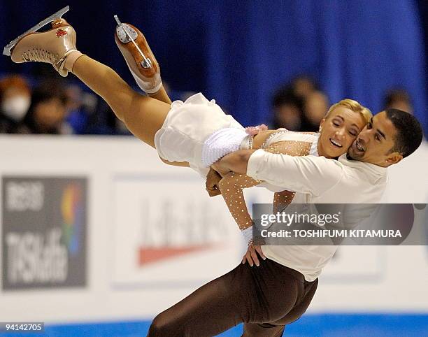 Aliona Savchenko and Robin Szolkowy of Germany perform their free skating program during the pairs' competition in the figure skating ISU Grand Prix...