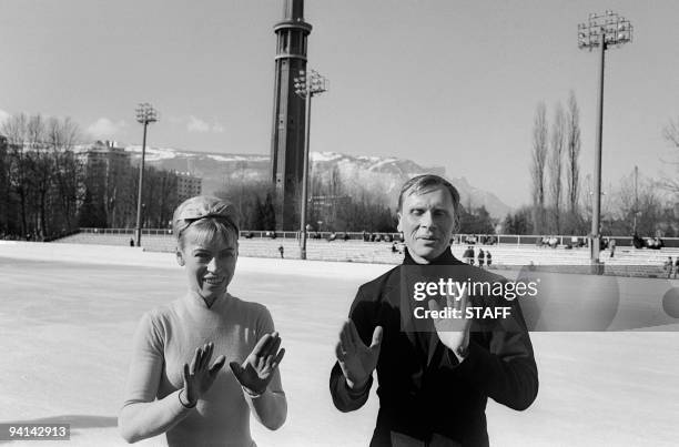 Lyudmila Belousova and her partner Oleg Protopopov from the Soviet Union joke in front of photographers February 1968 in Innsbruck. The Soviet couple...
