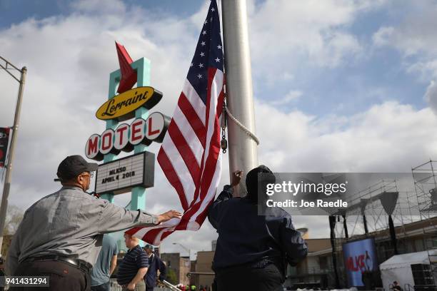 Danny Williams helps raise the American flag at the Lorraine Motel where Dr. Martin Luther King, Jr. Was assassinated almost 50 years ago April 3,...