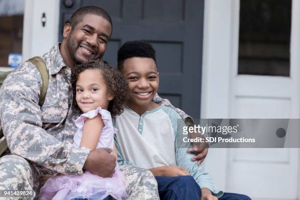 happy reunion - armed forces stock pictures, royalty-free photos & images
