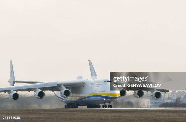 Worlds largest aircraft, the Antonov An-225 Mriya cargo aeroplane, takes off from the Antonov plant's airdrome in Gostomel, some 30 kilometres from...