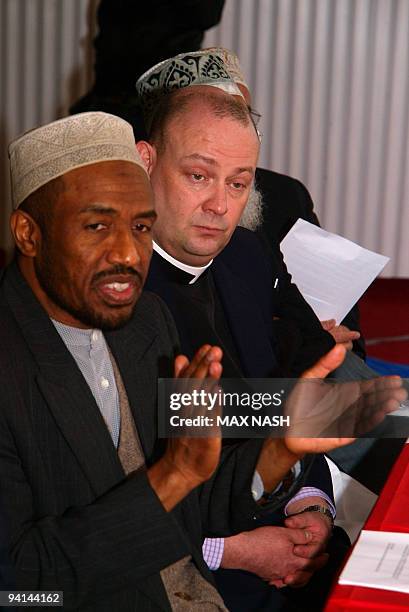 Sheikh Babiker, Iman and Spiritual director of the muslim Islamia schools and Canon Dr. Giles Fraser, Chancellor of St. Paul's Cathedral applaud...