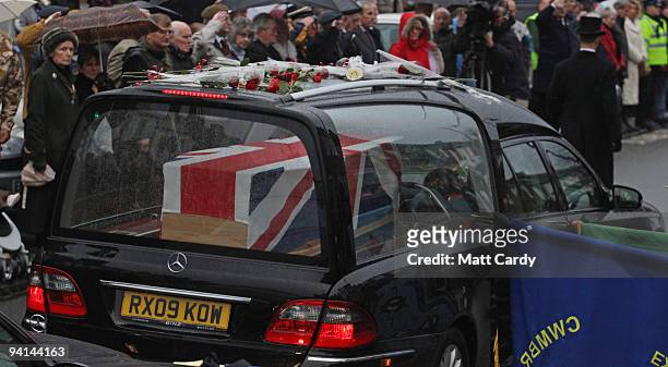 Mourners lining the High Street as the hearse carrying the body of Acting Sergeant John Paxton Amer of 1st Battalion Coldstream Guards, passes on...