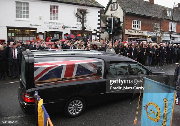 Mourners lining the High Street as the hearse carrying the body of Acting Sergeant John Paxton Amer of 1st Battalion Coldstream Guards, passes on...