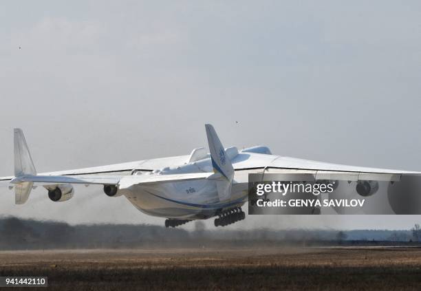 Worlds largest aircraft, the Antonov An-225 Mriya cargo aeroplane, takes off from the Antonov plant's airdrome in Gostomel, some 30 kilometres from...