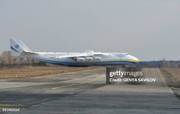 The worlds largest aircraft, the Antonov An-225 Mriya cargo aeroplane , prepares to take off from the Antonov plant's airdrome in Gostomel, some 30...
