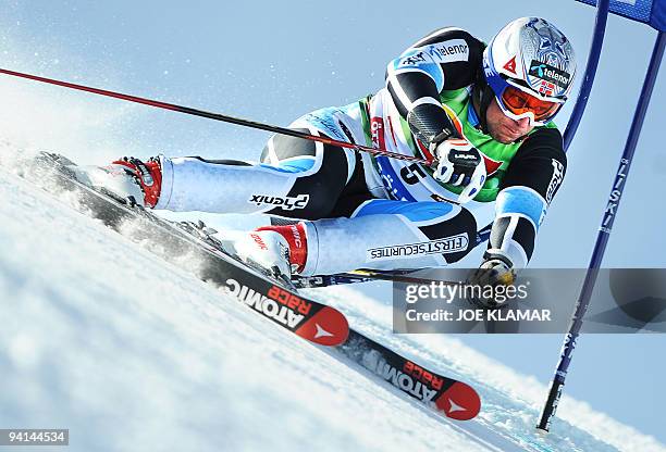 Norway's Aksel Lund Svindal competes in men's giant slalom during the opening of FIS Alpine Skiing World cup on Rettenbach glacier in Soelden on...