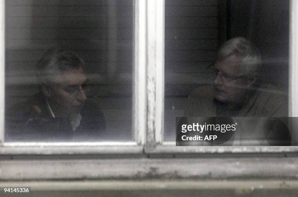 Andre Bamberski , father of Kalinka Bamberski, who died mysteriously in 1982, speaks with his lawyer Laurent De Caunes before his hearing by a judge...
