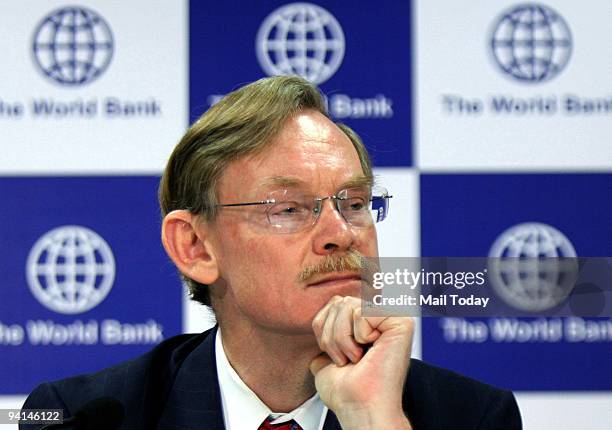 World Bank President Robert B. Zoellick gestures as he addresses a press conference in New Delhi on Friday, December 4, 2009.