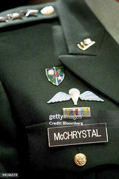 Pins adorn the jacket of Army General Stanley McChrystal, commander of U.S. Forces in Afghanistan, during a House Armed Services Committee hearing in...