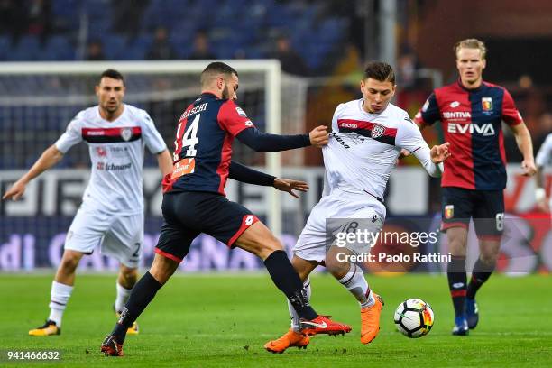 Nicolo Barella of Cagliari tries to get past Davide Biraschi of Genoa during the serie A match betweenGenoa CFC and Cagliari Calcio at Stadio Luigi...