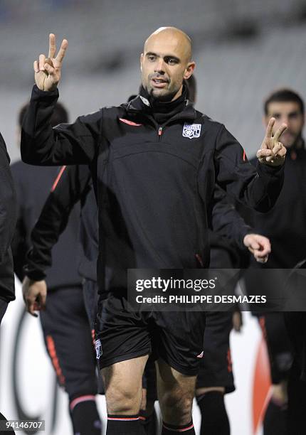 Lyon's Brazilian defender Cristiano Marques gestures during a training session at the Gerland stadium in Lyon, on December 8, 2009 on the eve of...