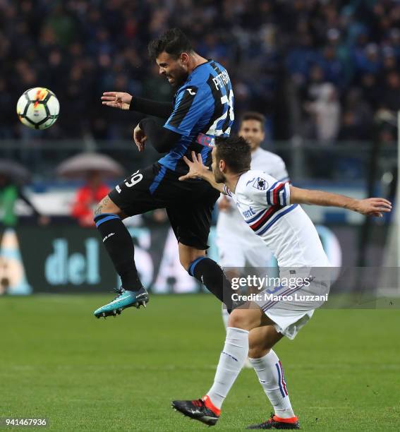 Andrea Petagna of Atalanta BC competes for the ball with Gian Marco Ferrari of UC Sampdoria during the serie A match between Atalanta BC and UC...