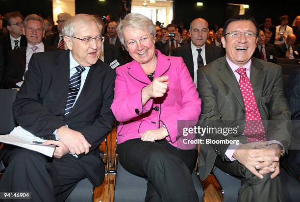 Rainer Bruederle, Germany's economy minister, left, Annette Schavan, Germany's education and research minister, center, and Wolfgang Reinhard, the...