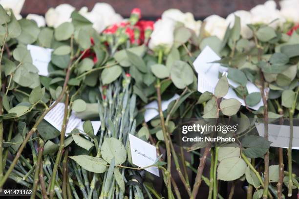 People lay flowers in memory of the victims of a subway explosion one year ago in St. Petersburg, Russia, 03 April 2018. An explosion hit a metro...