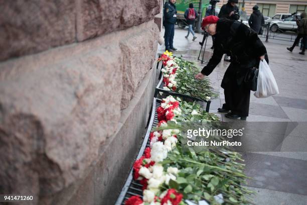 People lay flowers in memory of the victims of a subway explosion one year ago in St. Petersburg, Russia, 03 April 2018. An explosion hit a metro...