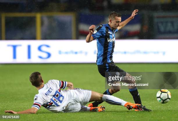Timothy Castagne of Atalanta BC competes for the ball with Dennis Praet of UC Sampdoria during the serie A match between Atalanta BC and UC Sampdoria...