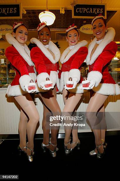 Radio City Rockettes Sagan Rose, Lisa Lewis, Corinne Tighe and Kate Hamrah attend the Rockette red velvet cupcake kick off at Magnolia Bakery...