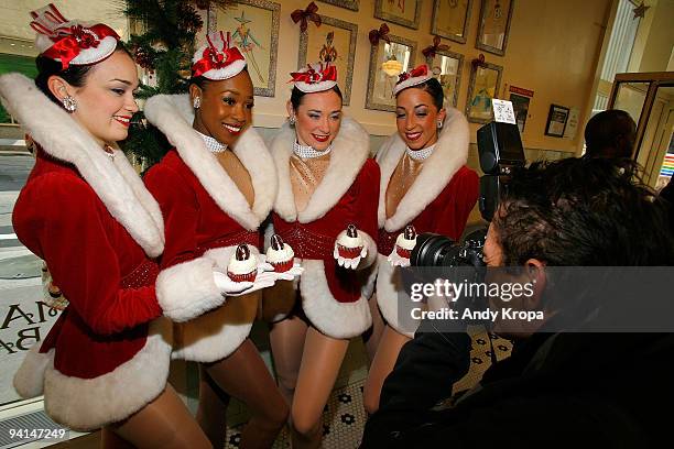 Radio City Rockettes Sagan Rose, Lisa Lewis, Corinne Tighe and Kate Hamrah attend the Rockette red velvet cupcake kick off at Magnolia Bakery...