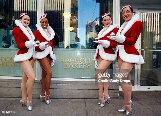 Radio City Rockettes Sagan Rose, Lisa Lewis, Corinne Tighe and Kate Hamrah attend the Rockette red velvet cupcake kick off at Magnolia Bakery...