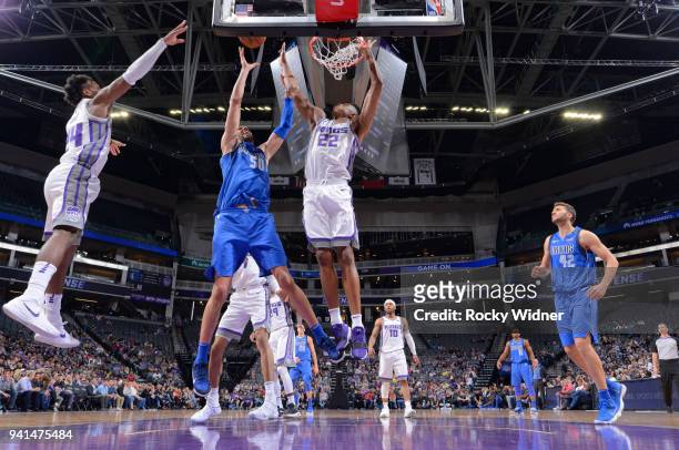 Salah Mejri of the Dallas Mavericks shoots against Bruno Caboclo of the Sacramento Kings on March 27, 2018 at Golden 1 Center in Sacramento,...