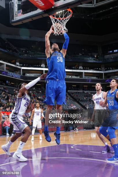 Salah Mejri of the Dallas Mavericks dunks against the Sacramento Kings on March 27, 2018 at Golden 1 Center in Sacramento, California. NOTE TO USER:...