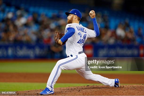 Toronto Blue Jays Pitcher Danny Barnes pitches during the MLB game between the New York Yankees and the Toronto Blue Jays at Rogers Centre in...