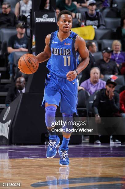 Yogi Ferrell of the Dallas Mavericks brings the ball up the court against the Sacramento Kings on March 27, 2018 at Golden 1 Center in Sacramento,...