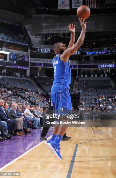 Aaron Harrison of the Dallas Mavericks shoots a three pointer against the Sacramento Kings on March 27, 2018 at Golden 1 Center in Sacramento,...