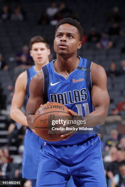 Yogi Ferrell of the Dallas Mavericks attempts a free-throw shot against the Sacramento Kings on March 27, 2018 at Golden 1 Center in Sacramento,...