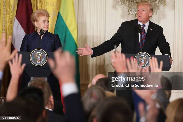 Lithuanian President Dalia Grybauskaite and U.S. President Donald Trump hold a joint news conference in the East Room of the White House April 3,...