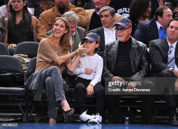 Celine Dion, Rene Charles Angelil and Rene Angelil attend the Portland Trailblazers Vs. New York Knicks game at Madison Square Garden on December 7,...