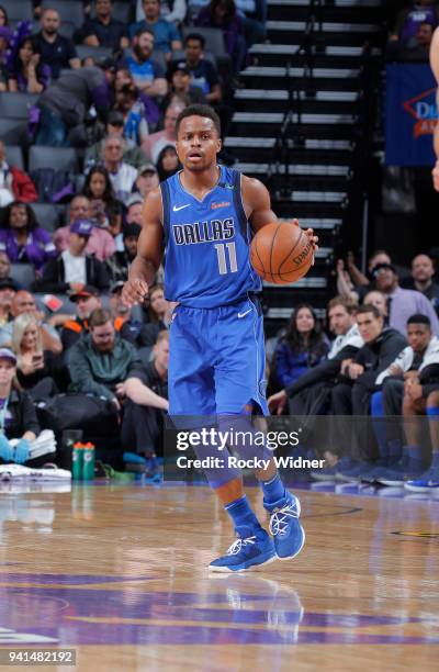 Yogi Ferrell of the Dallas Mavericks brings the ball up the court against the Sacramento Kings on March 27, 2018 at Golden 1 Center in Sacramento,...