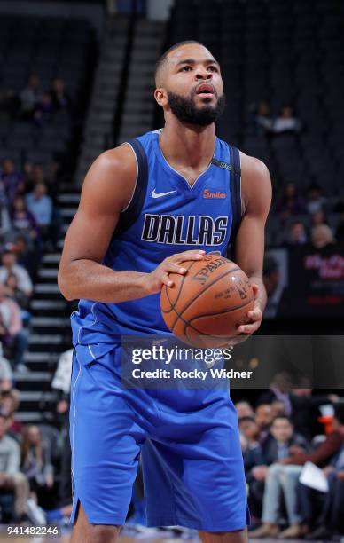 Aaron Harrison of the Dallas Mavericks attempts a free-throw shot against the Sacramento Kings on March 27, 2018 at Golden 1 Center in Sacramento,...