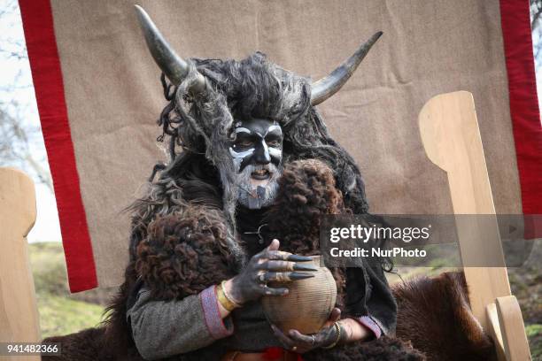 Man dressed as Slavic god Veles during Rekawka annual traditional festival held on the Krakus Mound in Krakow, Poland on 3 April, 2018. During this...