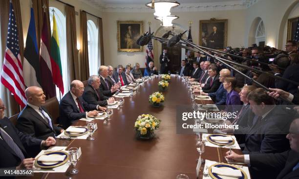 President Donald Trump, center left, speaks during a meeting with Baltic leaders in the Cabinet Room of the White House in Washington, D.C., U.S., on...