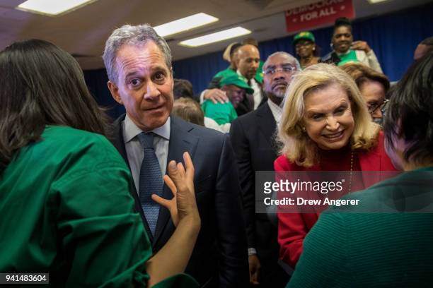 New York Attorney General Eric Schneiderman and U.S. Rep. Carolyn Maloney exit a press conference to announce a multi-state lawsuit to block the...